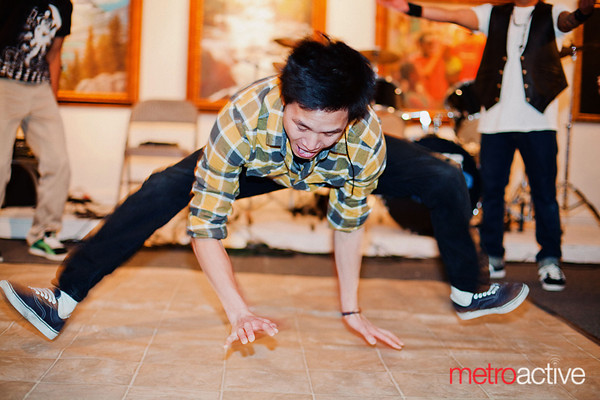 Richard Tran, a member of Above As One, shows of his wild style.
