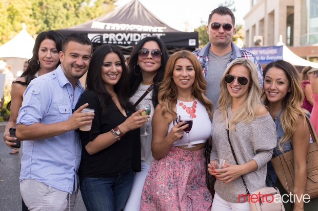 A group of festival attendees enjoy a drink at the Mountain View Art & Wine Festival.