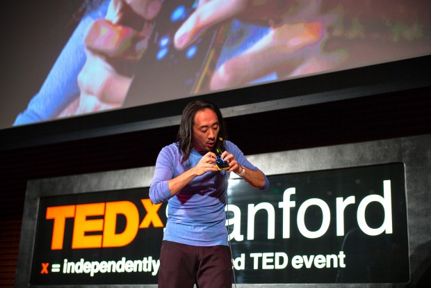 Ge Wang, assistant professor at the Center for Computer Research in Music and Acoustics, plays his iPhone. "Computer music isn't really about computers; it's about people."