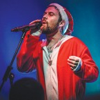 BAD SANTA: Eric Victorino, lead singer of The Limousines, at last year’s ‘XXX-Mas’ party.