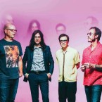 SHORELINE SCORCHO: Watch Grunge leg-drop New Jack through a press table at Shoreline with Weezer & The Pixies.