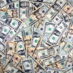 WILLOW WISH: Before they're donated to charity, patrons can guess how many dollar bills are glued to Willow Den's ceiling for a free bar tab.