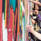 KEEP IT 100: A group mural on South First St., consisting of 100 artists' work, is unveiled this Friday.