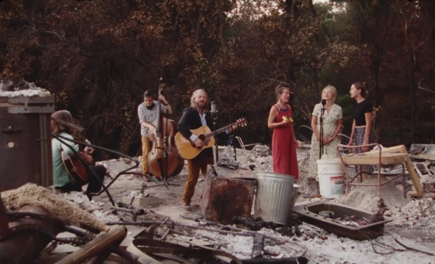 GUARDIN' PAIN: Cosmic mountain folk rockers Wolf Jett in the remains of their former home.