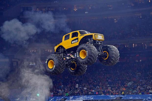 HIGH FLYING: The mind-boggling driving stunts of Monster Jam take center stage at the SAP Center this weekend.